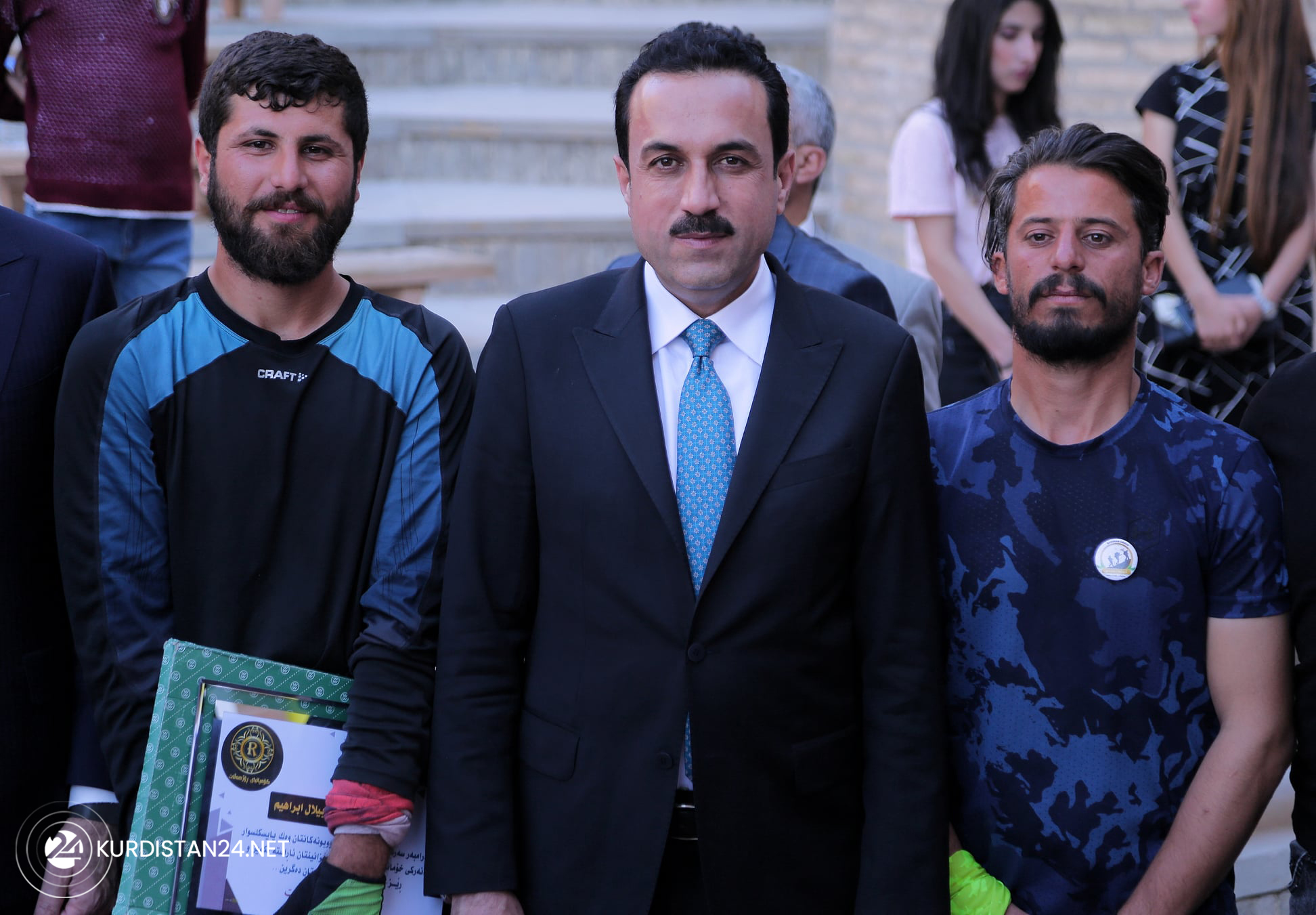 Erbil Governor Omed Khoshnaw (center) poses for a photo with Bilal Ibrahim (left) and Sha'ban Shawkat (right) on Erbil Citadel, Oct. 24, 2021. (Photo: Erbil Governorate)